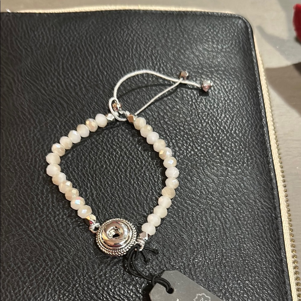 Elegant Silver and Cream Beaded Bracelet